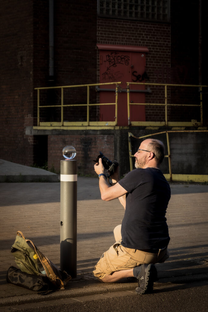 Bei der Arbeit Glaskugel Fotografie